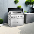 Six-burner stainless steel outdoor kitchen grill with black galaxy granite countertops