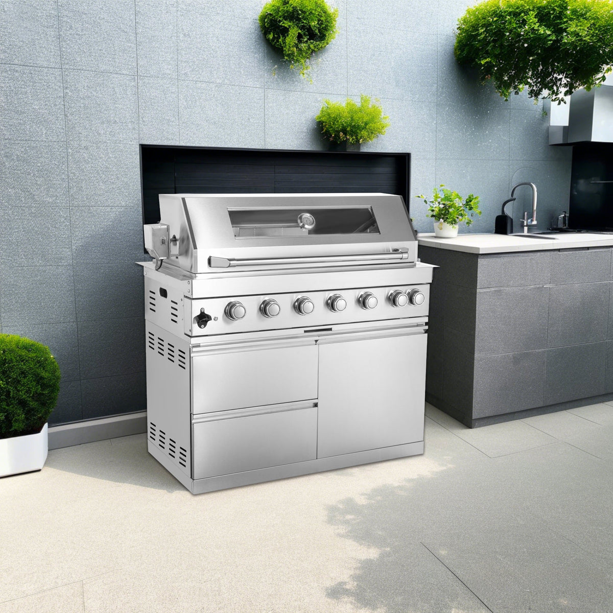 Six-burner stainless steel outdoor kitchen grill with black galaxy granite countertops